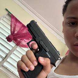 Gun in Hand Photo Edit