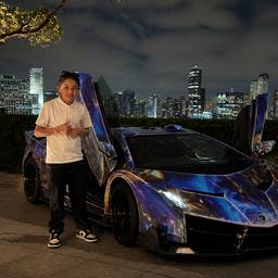 Man Next to Lamborghini