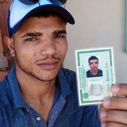 After - Holding My ID Card