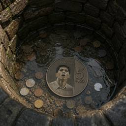 Coin in Wishing Well