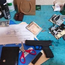 After - Gun on the Table