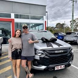After - Couple at Car Dealership