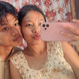 Playful Couple Mirror Selfie