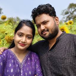 Couple in Sunflower Field