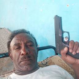 After - Pistol In Hand Photo