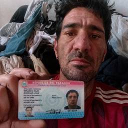 ID Card in Hand