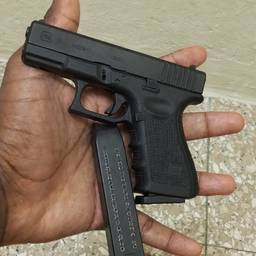 Gun in Hand Photo