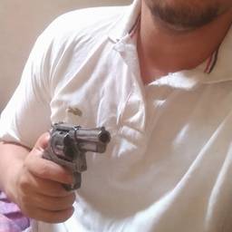 After - Revolver Hand Photo Edit