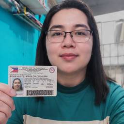 Woman Holding ID Card