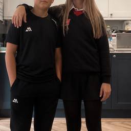 Two Kids Standing Together