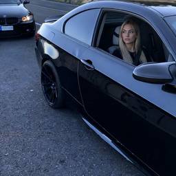 Girl in Sports Car