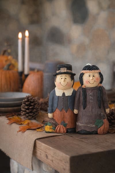 Pilgrim Figurines on Thanksgiving Table