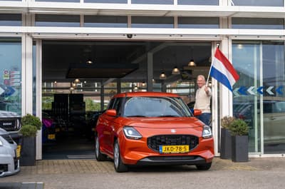 After - Man Holding Dutch Flag