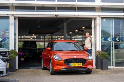 Before - Man Holding Dutch Flag