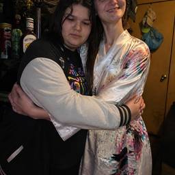 Two People Hugging Photo