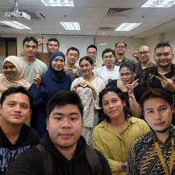 After - 16-Person Group Photo Merge