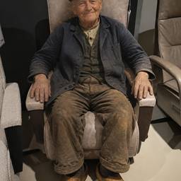 Old Farmer in Armchair